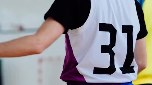 A man in a sports uniform with the number 31