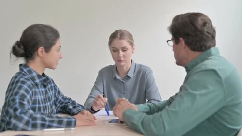 Team Having a Meeting in Office
