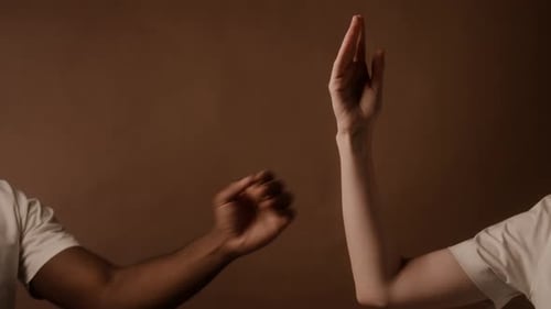 Interracial Helping Hands Supporting Each Other