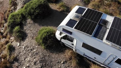 Caravan with Solar Panels on Roof. Aerial View.