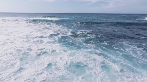 Aerial View of Rolling Ocean Waves Near Oahu Hawaii