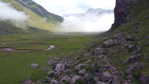 Spanish Pyrenees, Spain - Aerial Drone View of Valle de Aguas Tuertas Valley with Riverbed and Movin