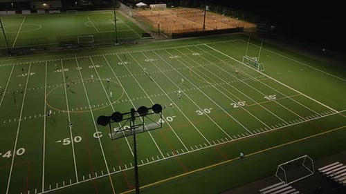 Aerial View Training Match at a Sports Stadium Between Women's Football Teams