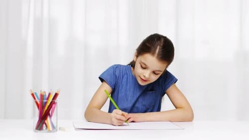 Girl Drawing with Colored Pencil at White Desk