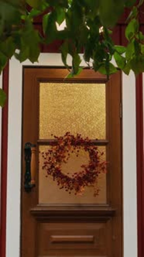 Fall Wreath on Wooden Door with Red Frame