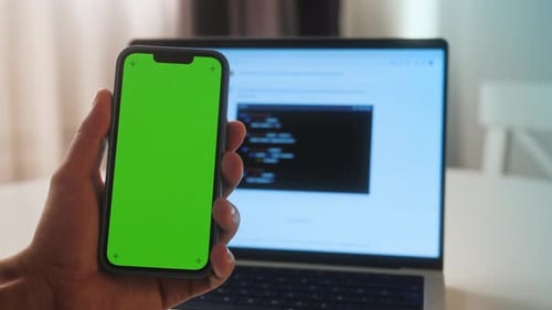 Phone with Chroma Key Green Screen with Man Working with Chatbot AI Online Connecting with AI and