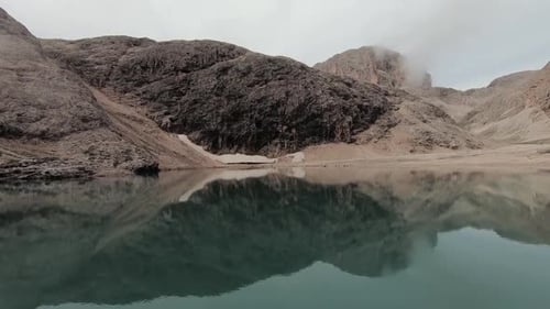 Lake antermoia slow mo camera panning from left to right