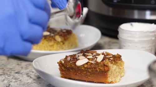 Close Up of Icing Cake in the Kitchen