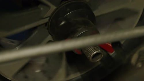 Close up of a wheel of a car being changed. Static