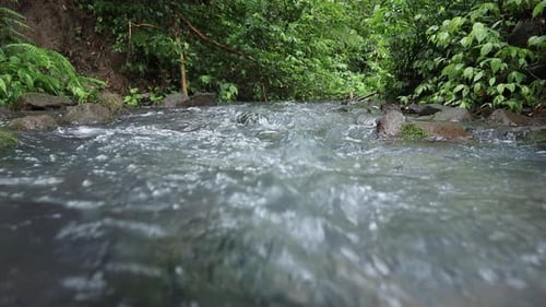 Clear flowing river water and clear flowing waterfalls