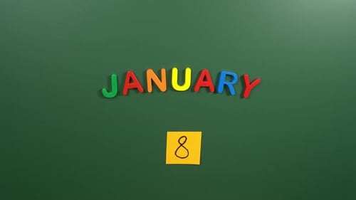 Hand sticking a sticker 8 January calendar day on school board. 8 date of January. Eighth day