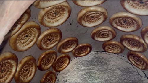 Loaves of Bread Pressed in Clay Oven