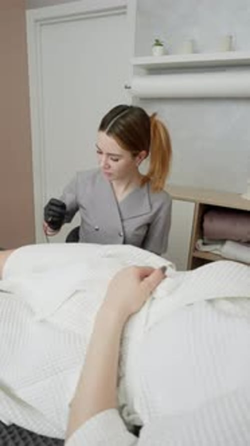 Woman Receiving Beauty Treatment in a Spa