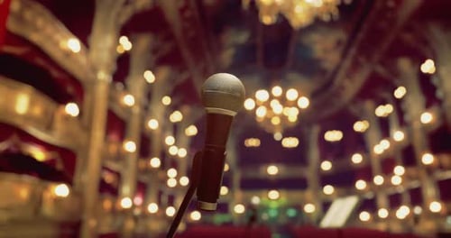 Microphone Positioned for Performance in an Elegantly Lit Theater