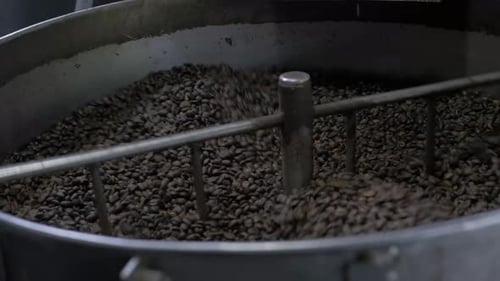 coffee beans spinning fast in roaster