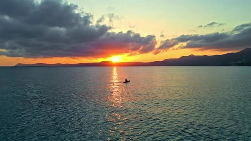 Fishing Boat Over Aegean Sea During Sunset Near Sitia In Crete, Greece. Wide Shot