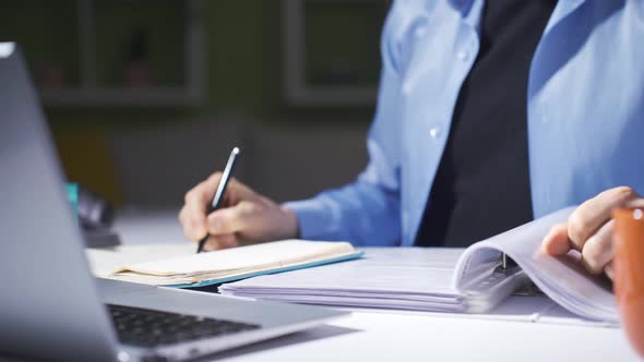 Home office worker examining files., People Stock Footage ft. office ...