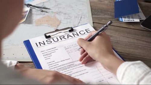 Travel Insurance Insurance Agent Filling Out The Documentation Form Travel Insurance To Another