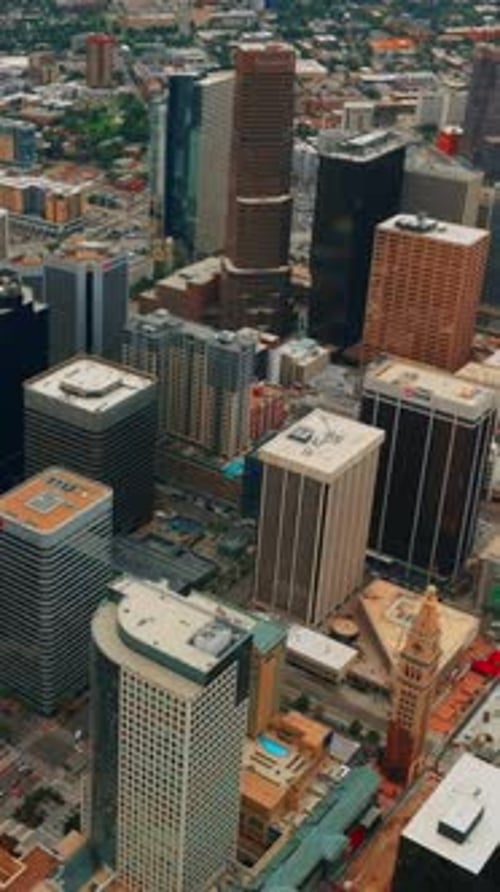 Looking at the tops of gorgeous skyscrapers in Denver downtown. Urban cityscape from bird's eye