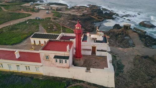 Scenic Lighthouse Standing Shoreline at Summer Evening Aerial View Red Beacon