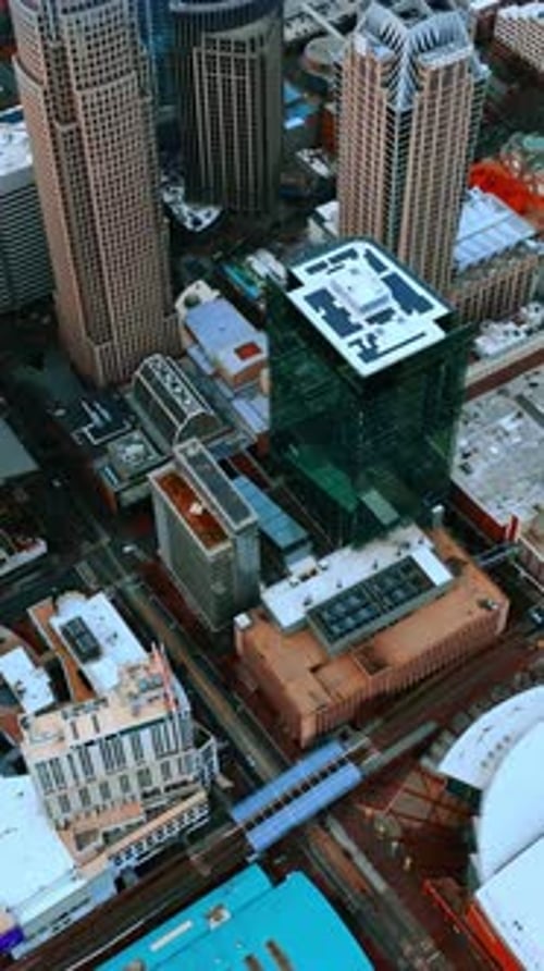 Roofs of diverse buildings in the architecture of modern city.