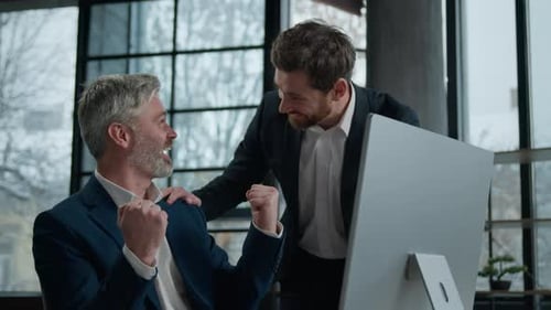 Colleagues Celebrate Success in the Workplace