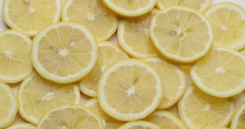 Top Down Background View Made of Fresh Sliced Organic Lemons Closeup