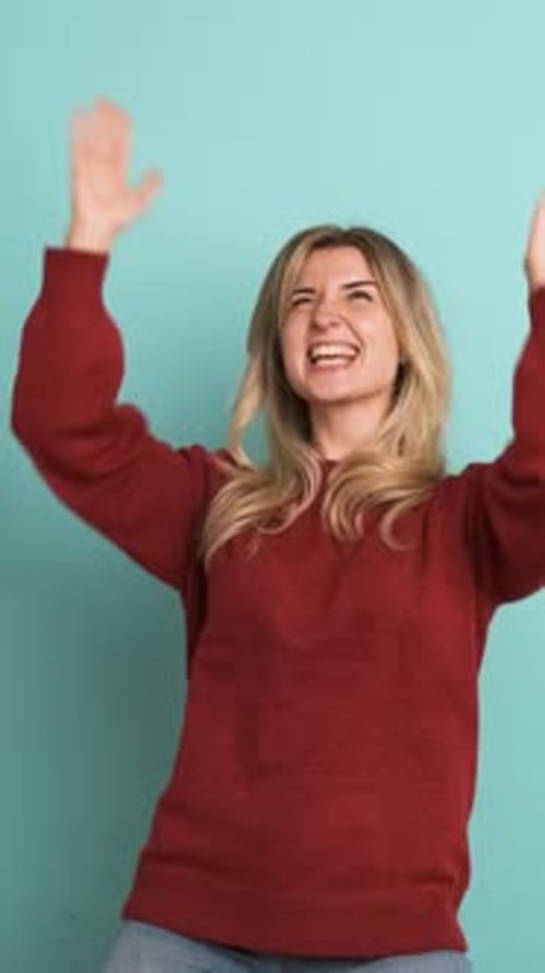 Young Woman Celebrates with Confetti