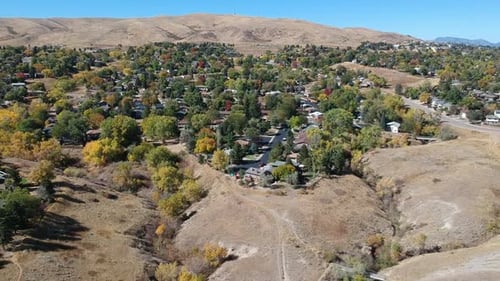 A drone flight over a Denver suburb on a fall day.