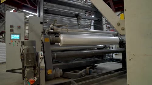 Producción automática de bolsas de plástico de polietileno en fábrica. Slow Dolly
Shot