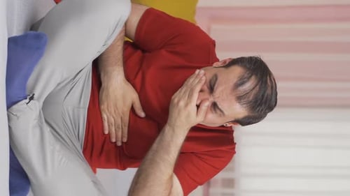 Vertical video of To vomit.