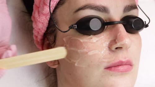 Woman Receives Facial Gel Treatment, Close Up