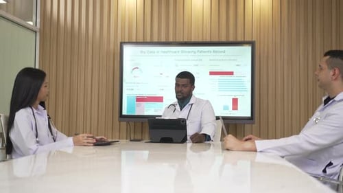 Medical Professionals Reviewing Healthcare Data Together