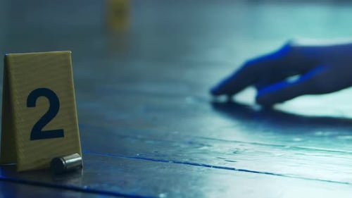 Crime Scene with Hand and Evidence Markers