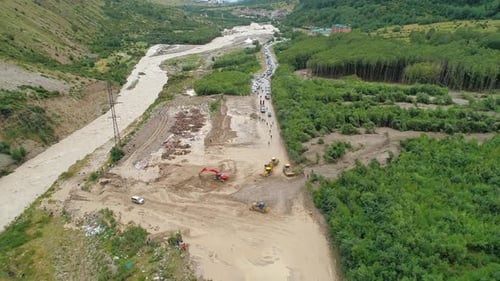 Aerial View of River Damage and Construction