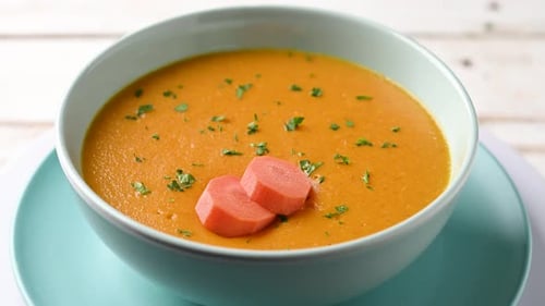 Bowl of Creamy Carrot Soup with Parsley
