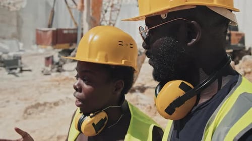 Black Man And Woman Co-working In Quarry