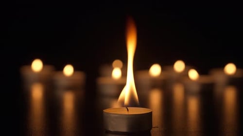 Elegant Candles Burning in the Night