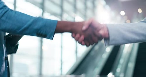 Business People Handshake in Urban Workplace