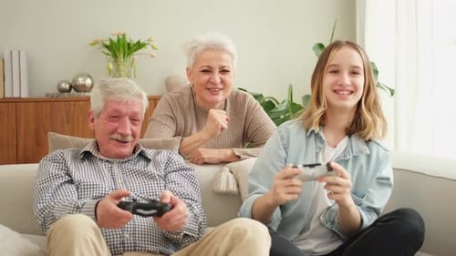 Happy Family Plays Video Games Together at Home