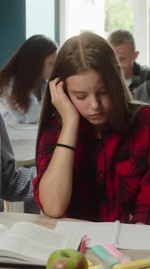 Crying Caucasian Teen Girl Sad Bullying in Classroom During Lesson School Conflict Classmate