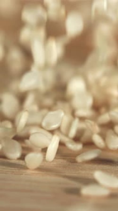 Falling Sesame Seeds on the Table