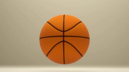 Spinning Basketball Floating in Air on Minimal Beige Background