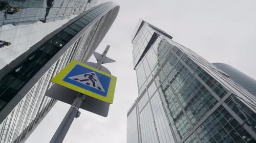 A Modern Urban Landscape with HighRise Buildings and a Prominently Displayed Traffic Sign Action