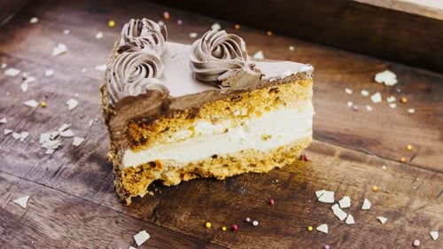 Delicious Slice of Chocolate Cake on Wood