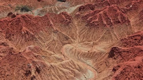 Vibrant Aerial Over La Tatacoa Desert's Red Landscapes in Colombia