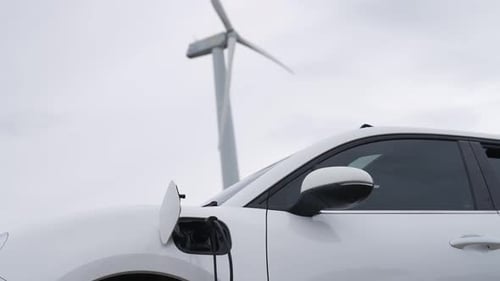 Progressive Combination of EV Car Charging Station and Wind Turbine