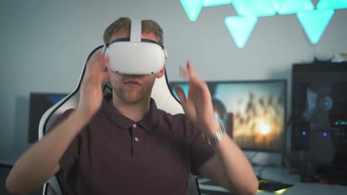 Man Puts on VR Headset in Office