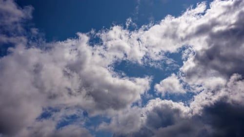Magnificent accelerated clouds with a beautiful blue sky in timelapse