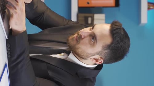 Enthusiastic Man Types and Celebrates Business Success